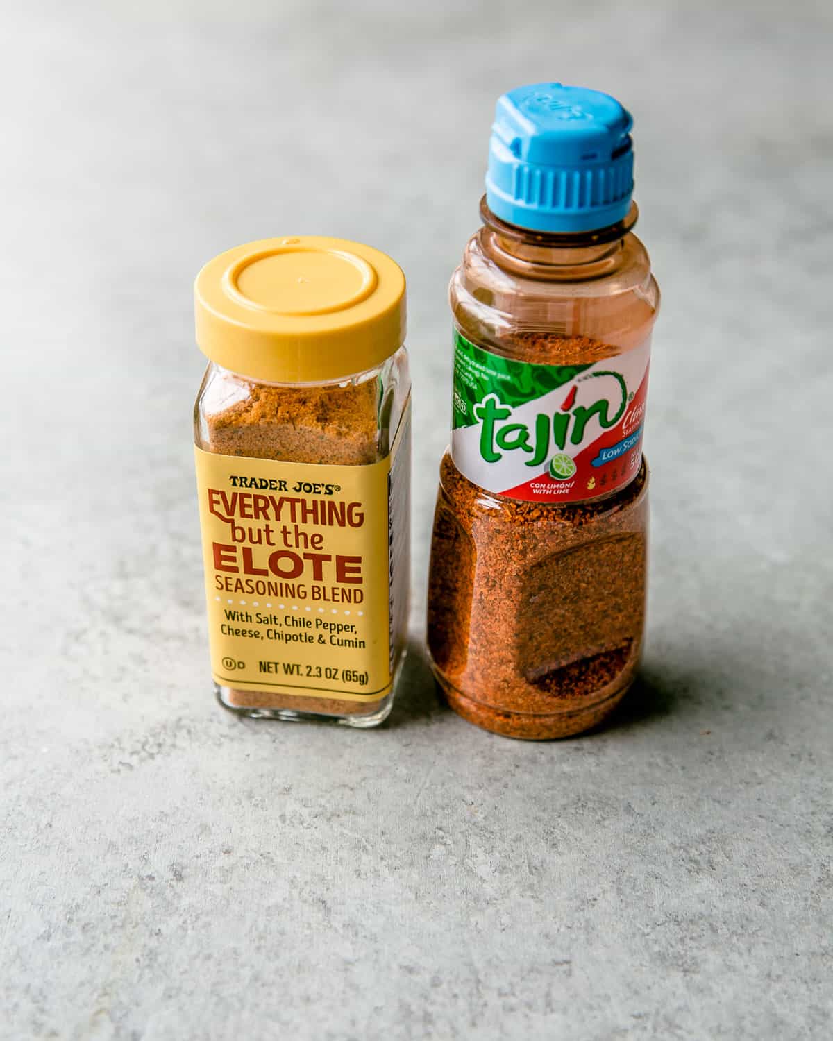 tajin and elote seasoning bottles