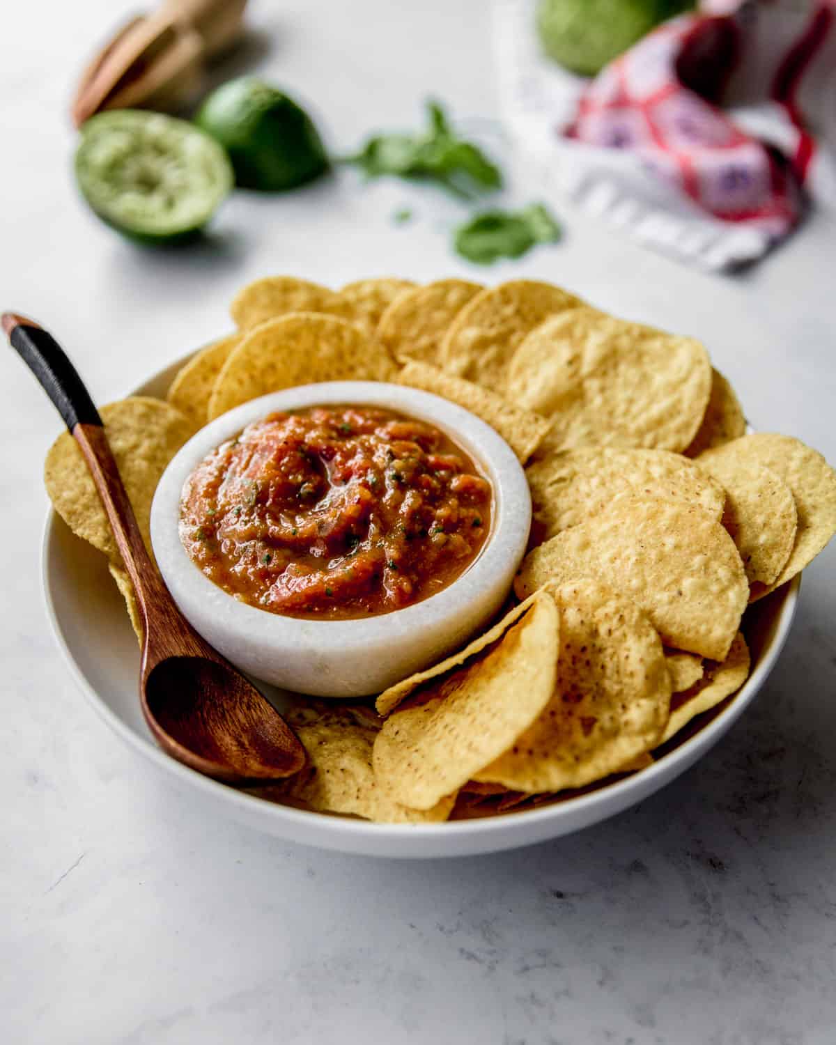 chips and salsa in white bowls