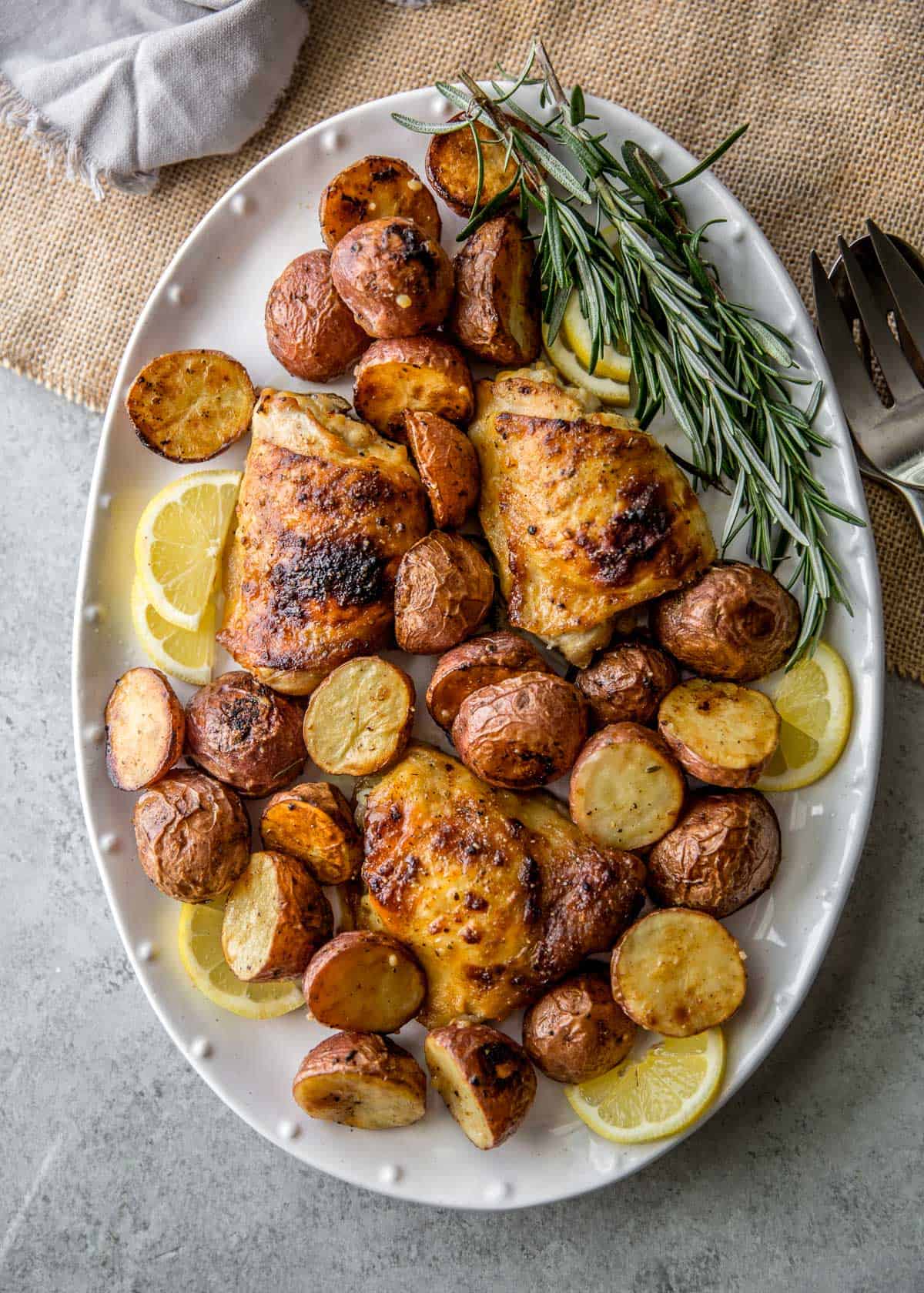 Sheet Pan Crispy Chicken Thighs and Lemon Rosemary Potatoes