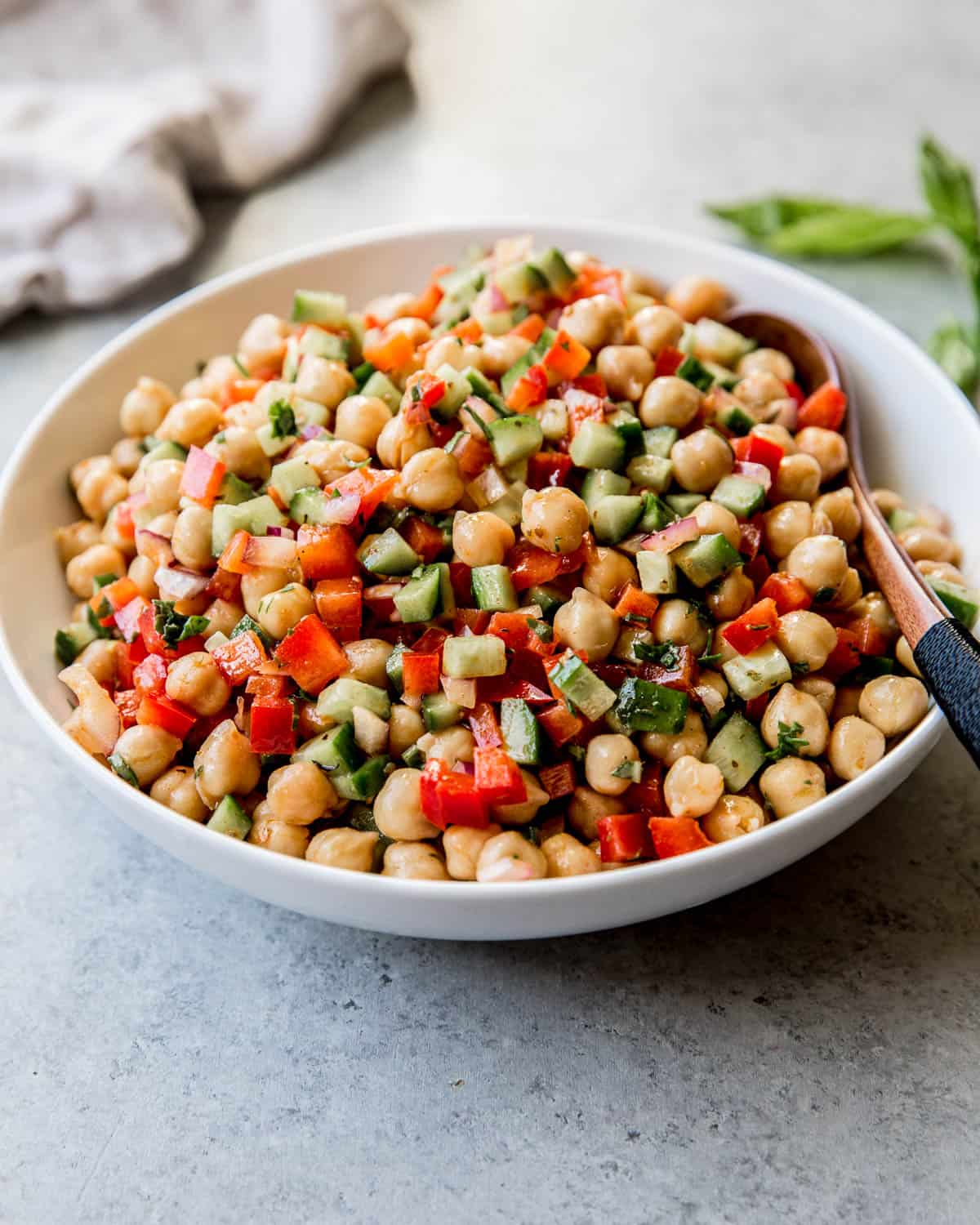 chickpeas in a white bowl on a grey countertop