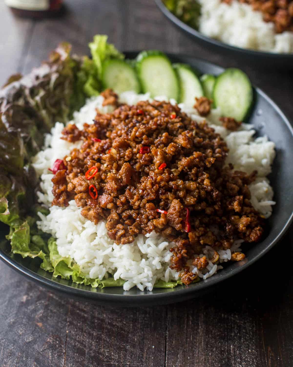 pork and rice bowls with cucumbers and lettuce