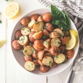 potatoes in a white bowl on a white table