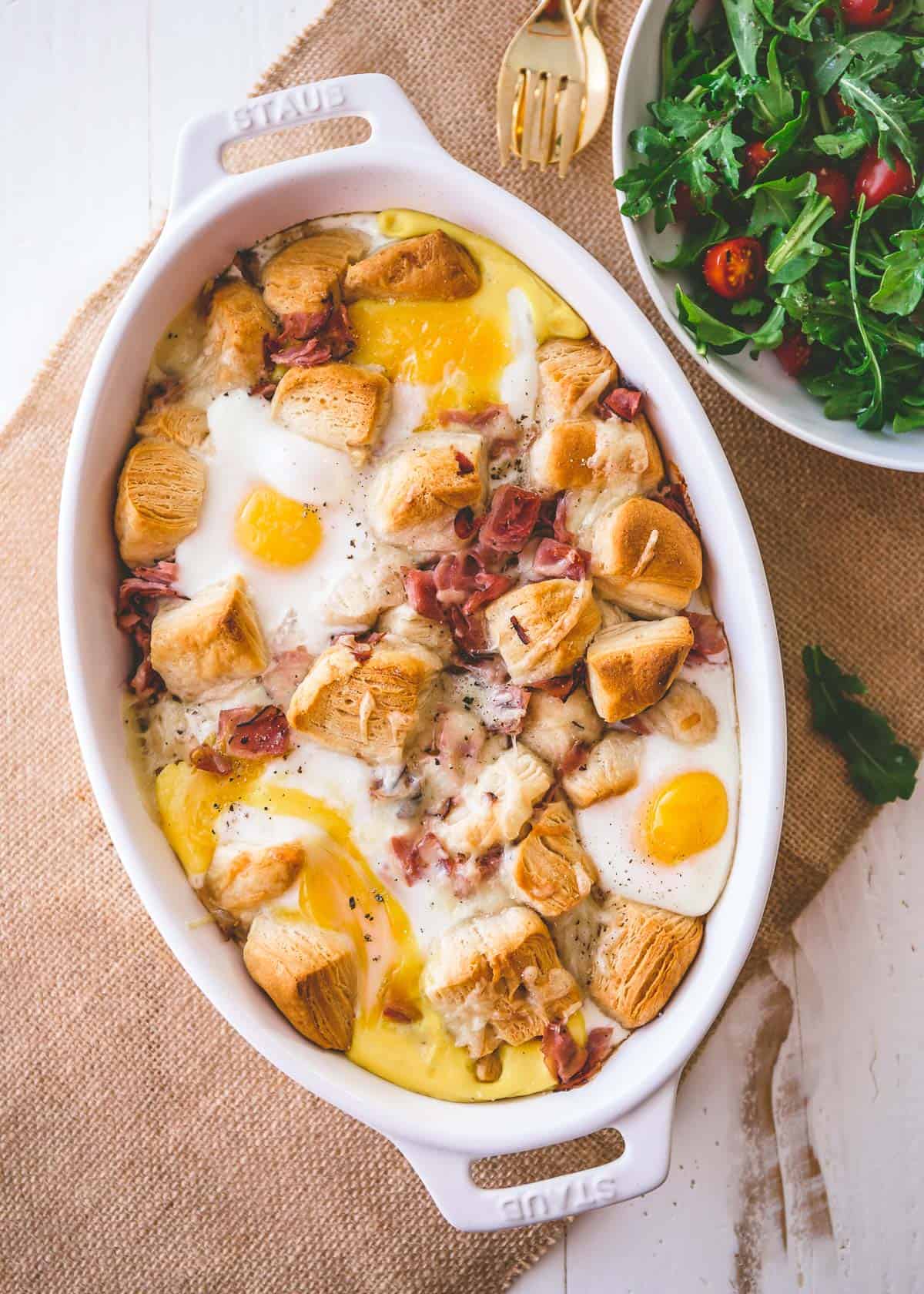 croque madam in a white oval baking dish