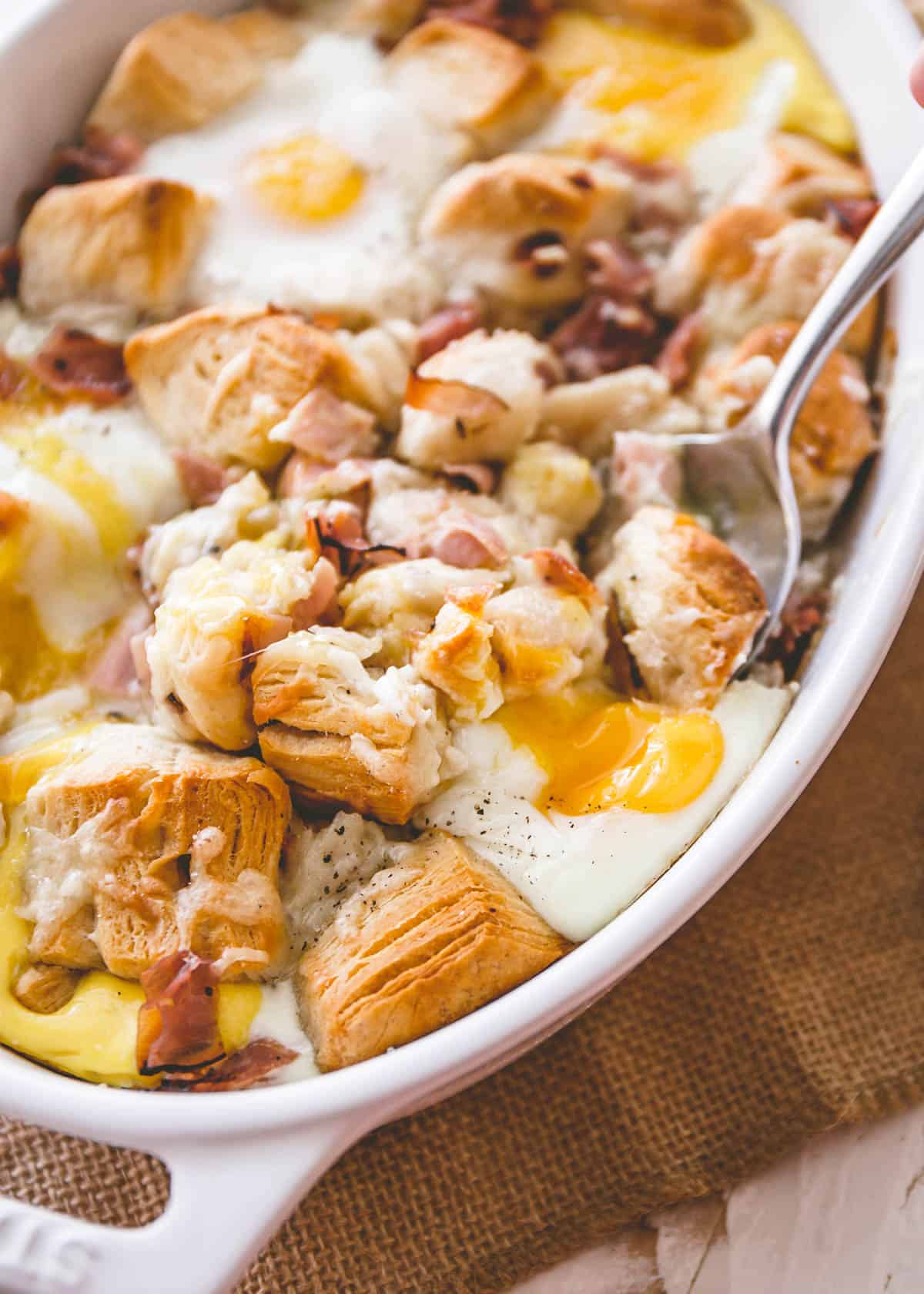 ham and cheese bake in a white baking dish