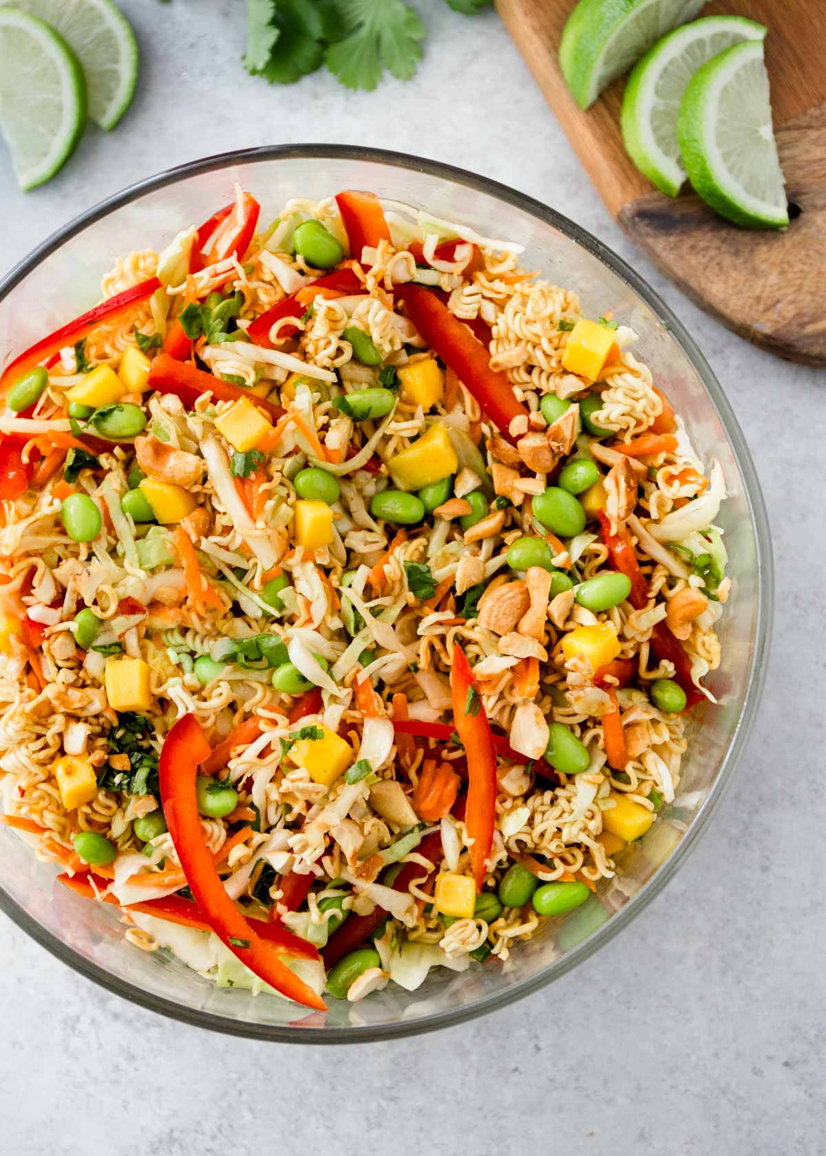 overhead image of thai raman noodle salad in a clear bowl