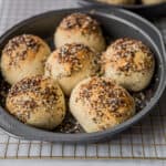 baked rolls in a round baking dish