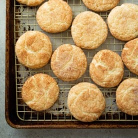 snickerdoodle cookies on a sheet pan