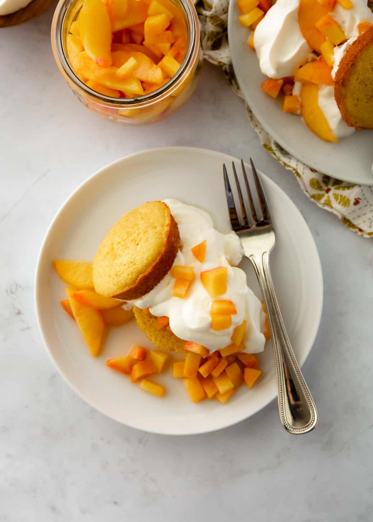 peach shortcakes on a white plate