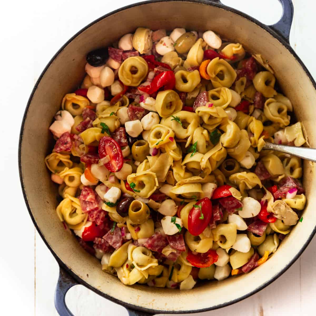 pasta salad in a blue dutch oven