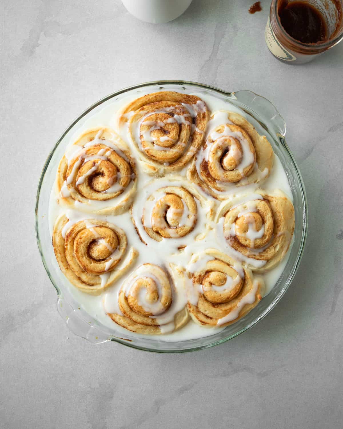 cinnamon rolls in a clear baking dish