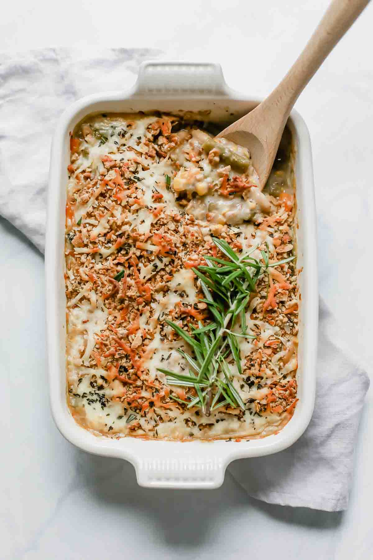 mixed vegetable casserole in a white baking dish