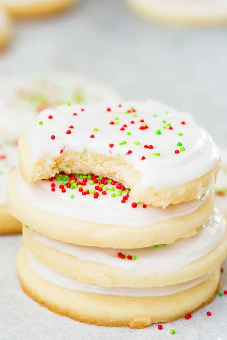 white chocolate sugar cookies stacked on a white table