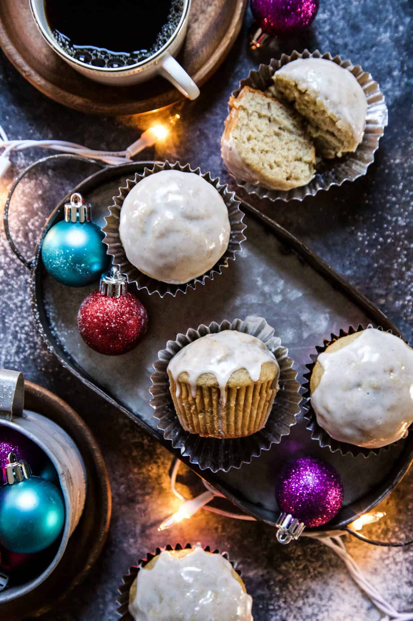 banana bread muffins surrounded by Christmas ornaments