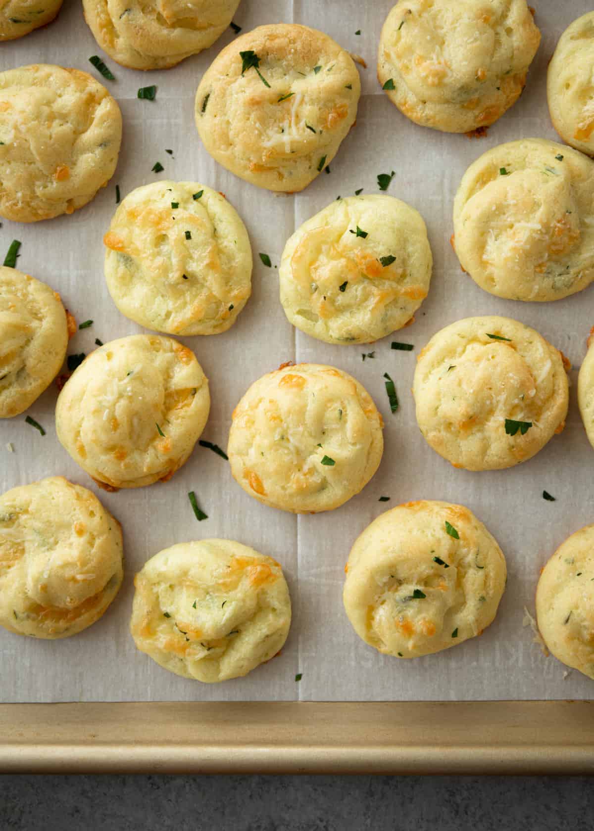 cheese puffs on a sheet pan