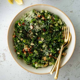 kale salad in a white bowl