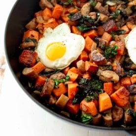 a close up of hash in a cast iron skillet