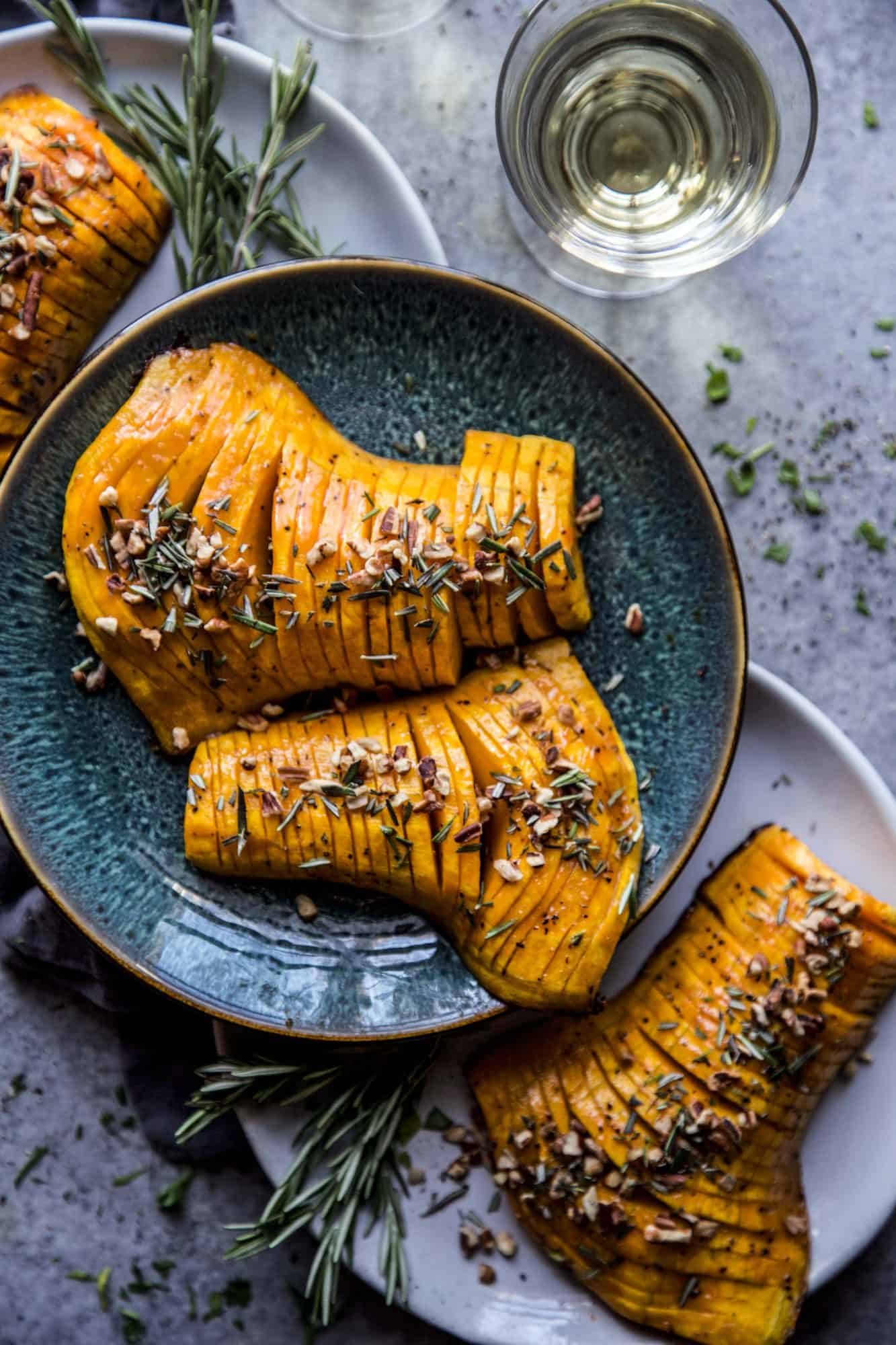 hasselback squash on a blue plate