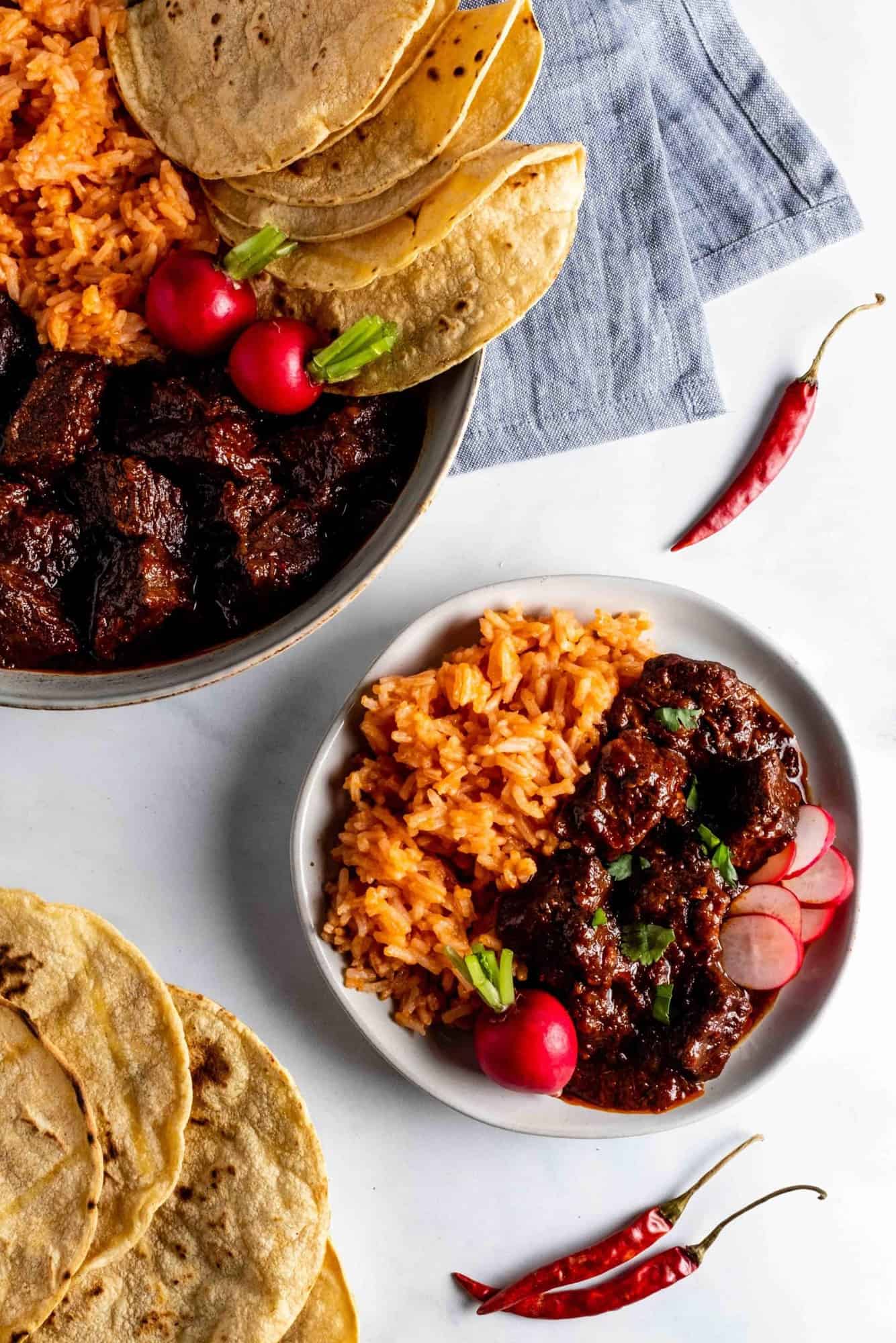 chili colorado in a white bowl