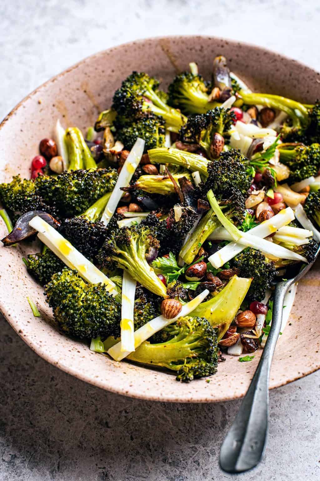 roasted broccoli salad in a brown bowl