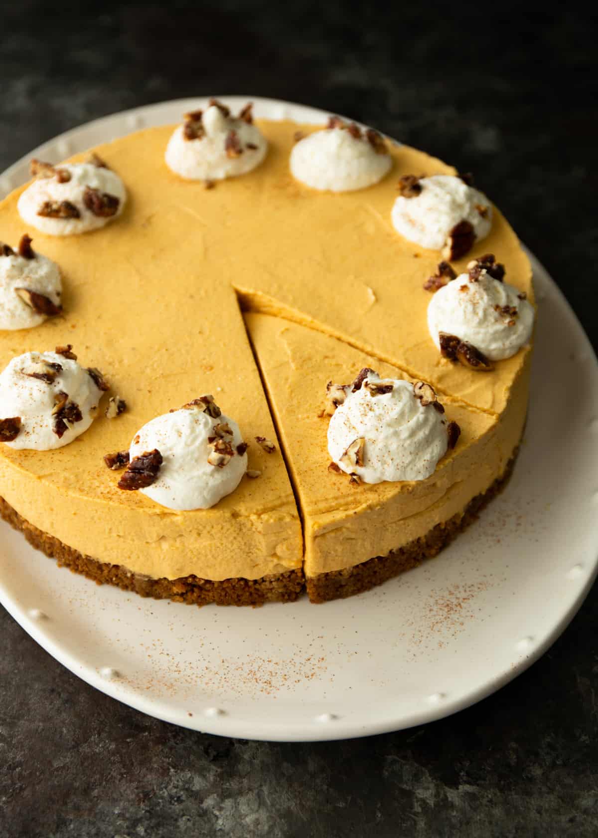 pumpkin cheesecake on a white tray