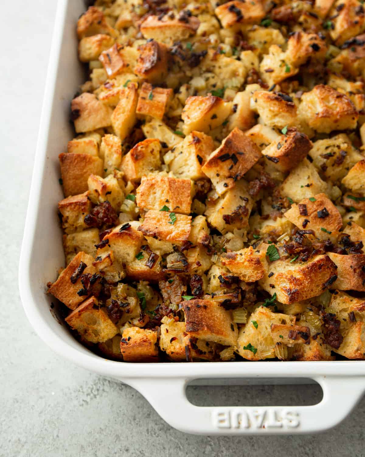 baked stuffing in a white baking dish