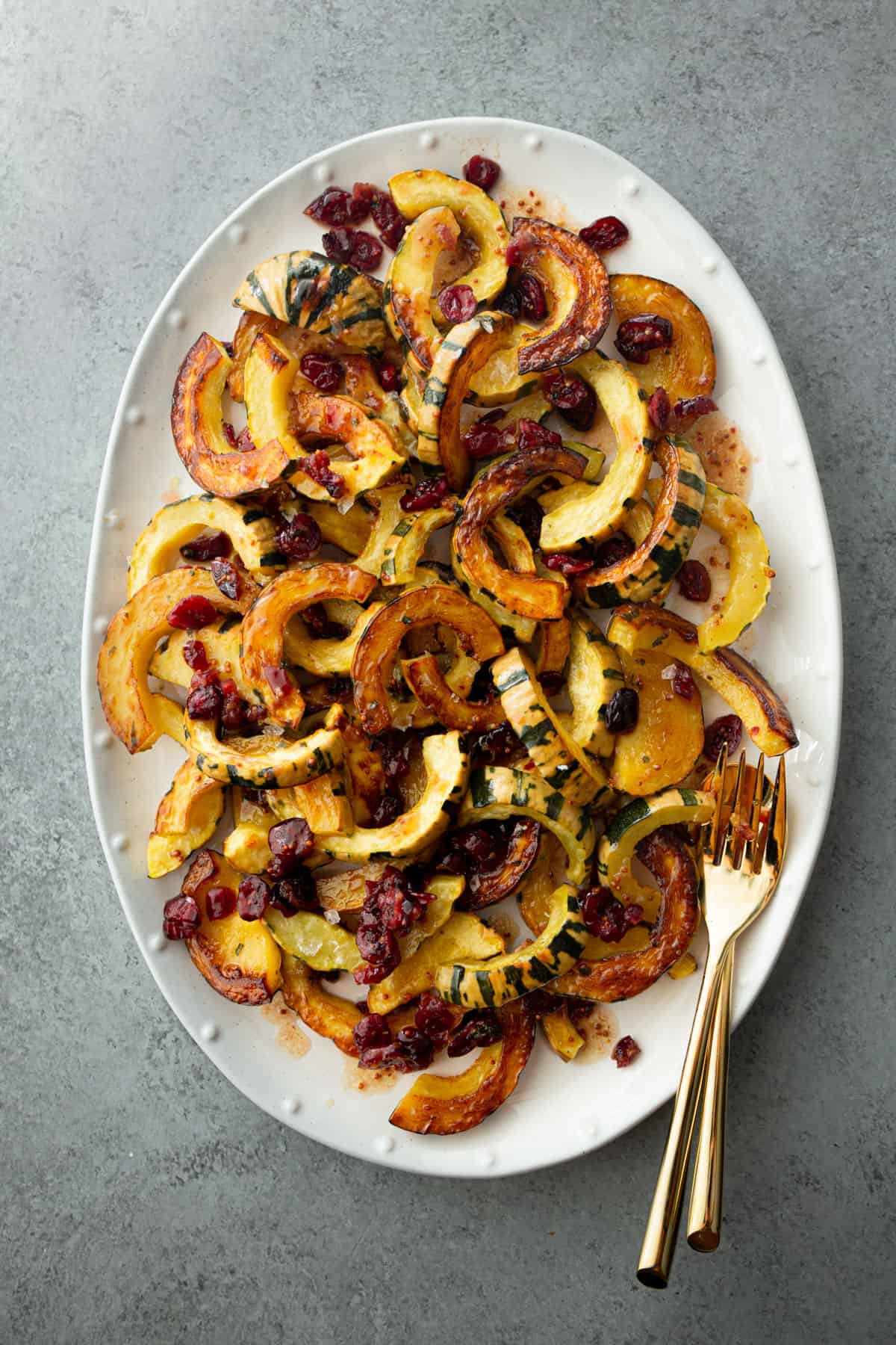 squash on a white oval tray