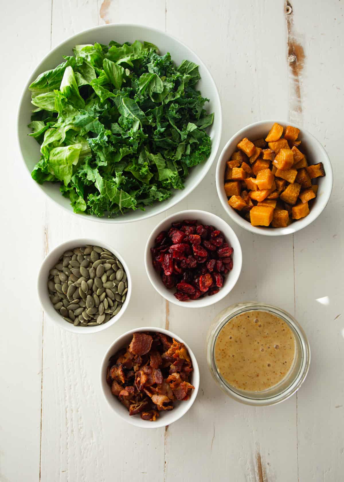 ingredients for squash salad on a white table