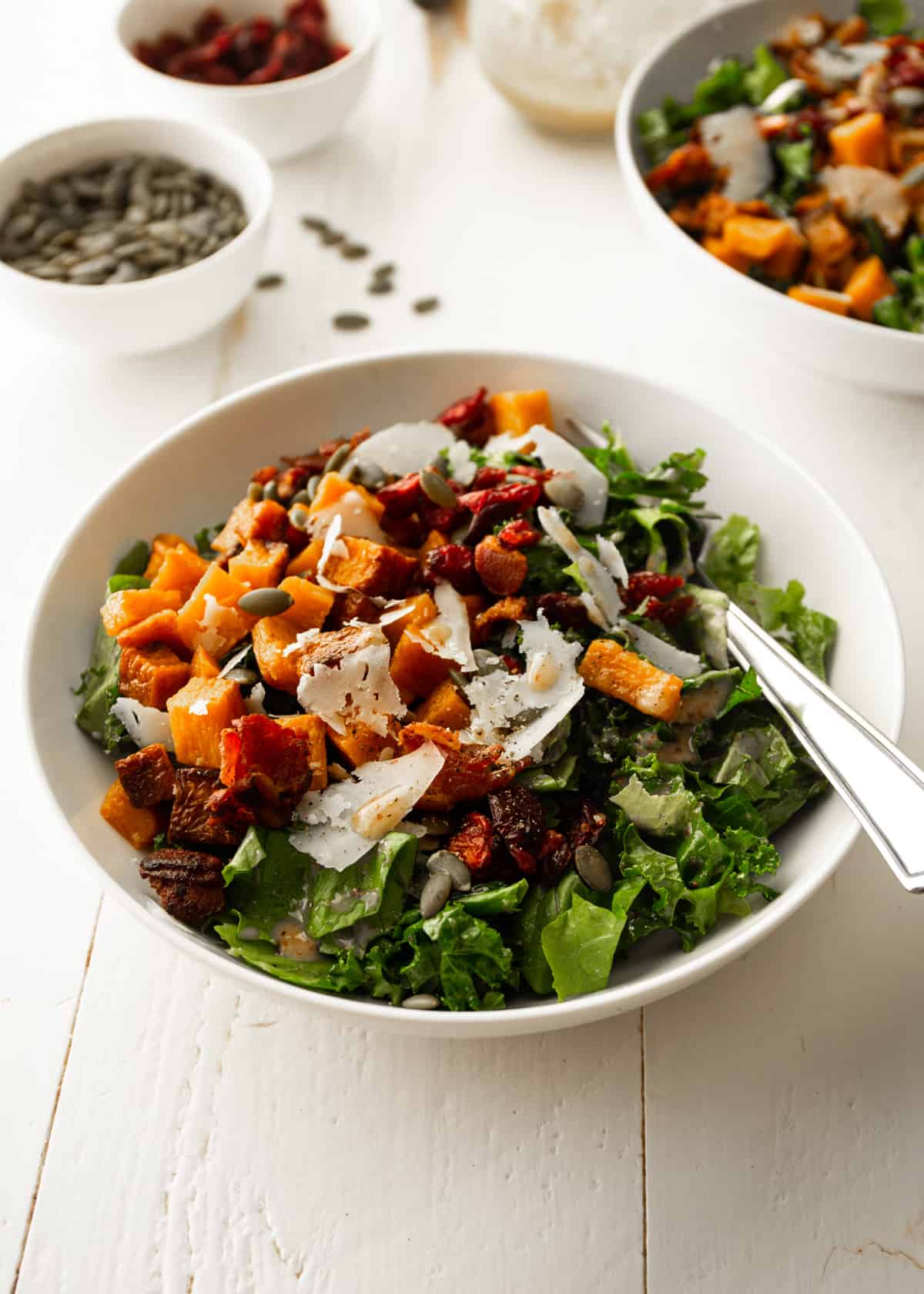 squash salad in a white bowl