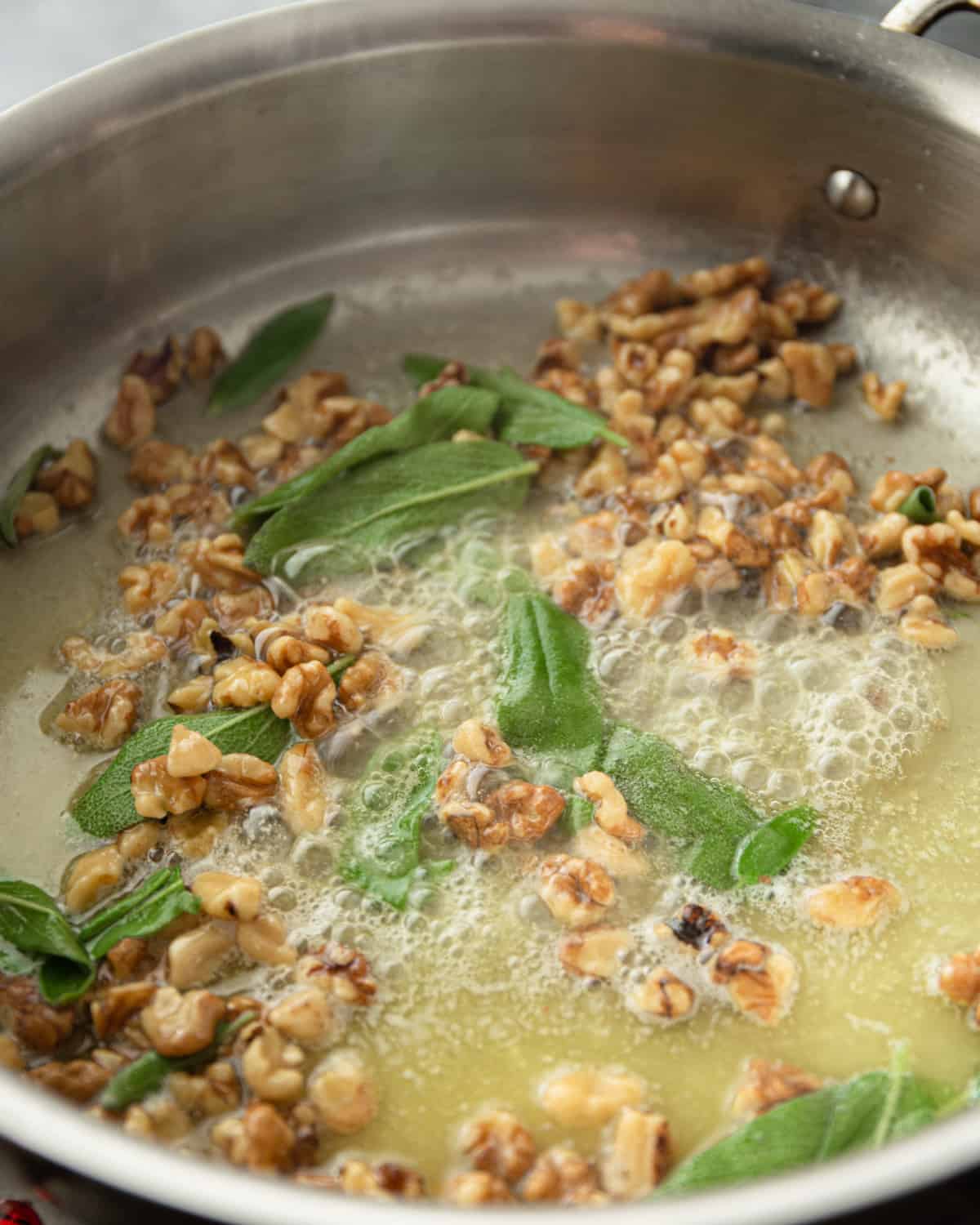 sage and brown butter sauce in a saute pan