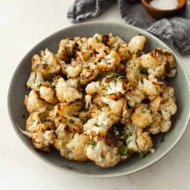 roasted cauliflower in a grey bowl