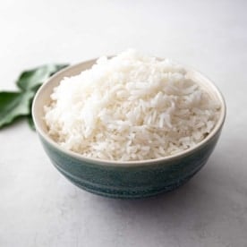 coconut rice in a large blue bowl