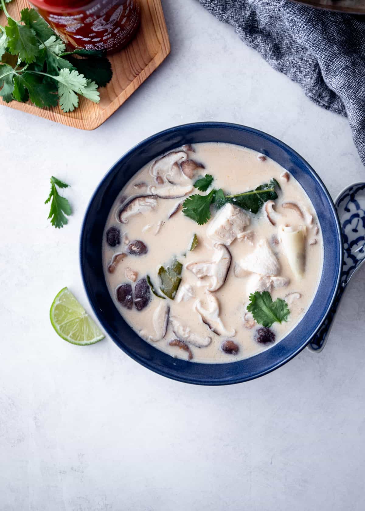 thai soup in a black bowl