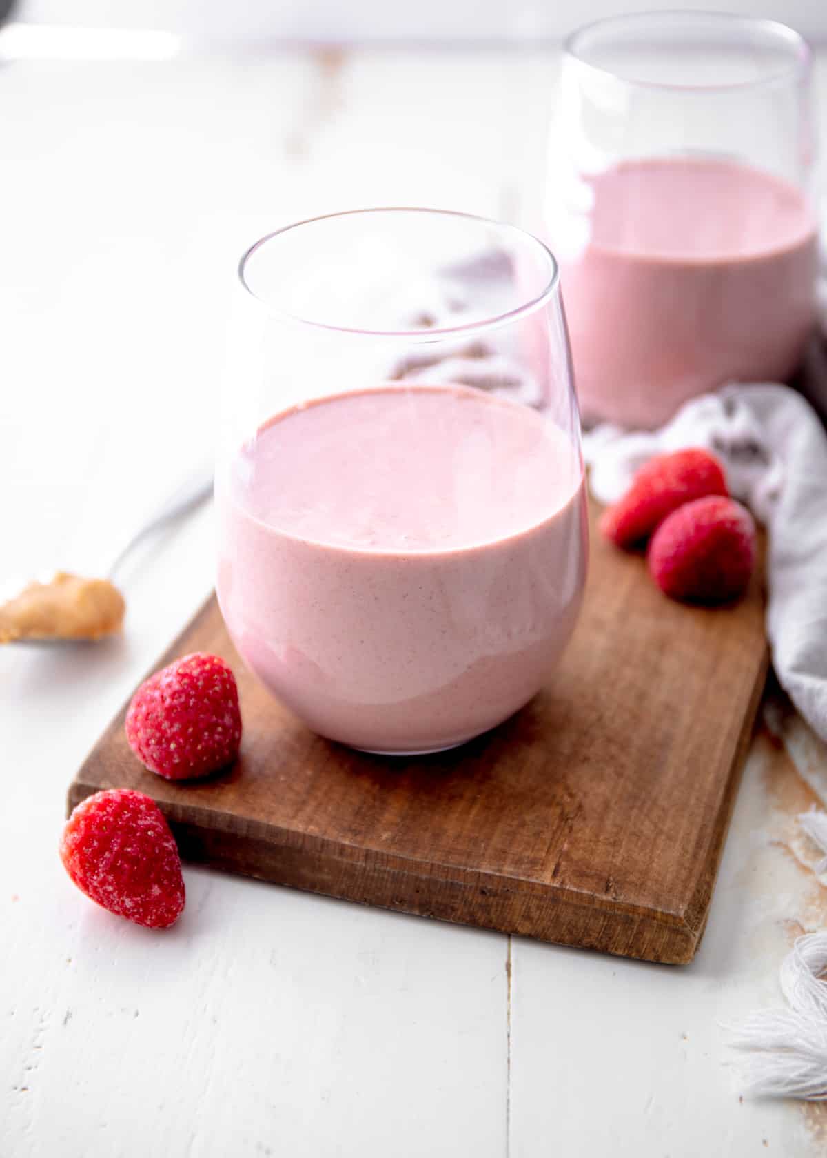 strawberry smoothie in a small glass