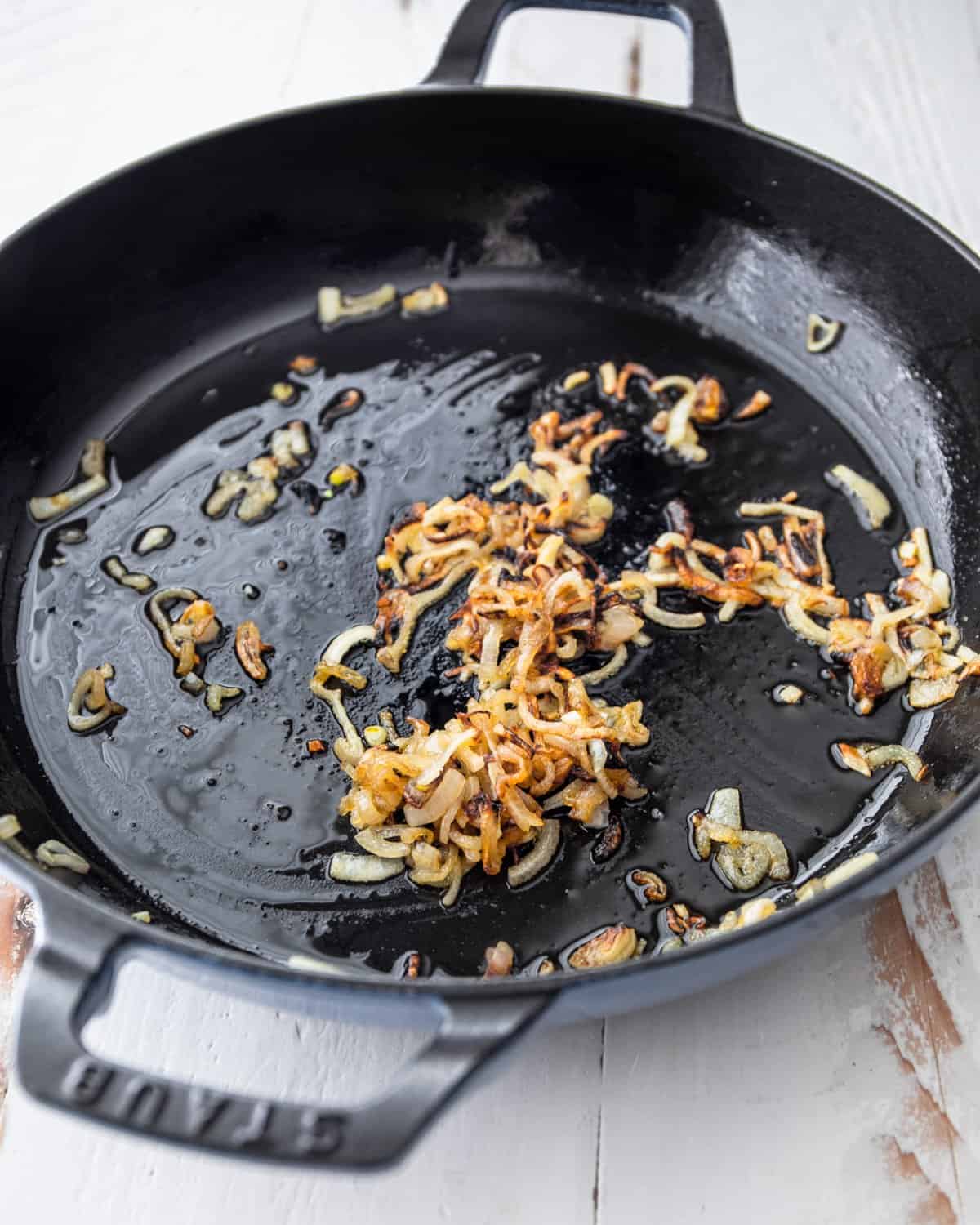 sauteeing shallots in a cast iron skillet