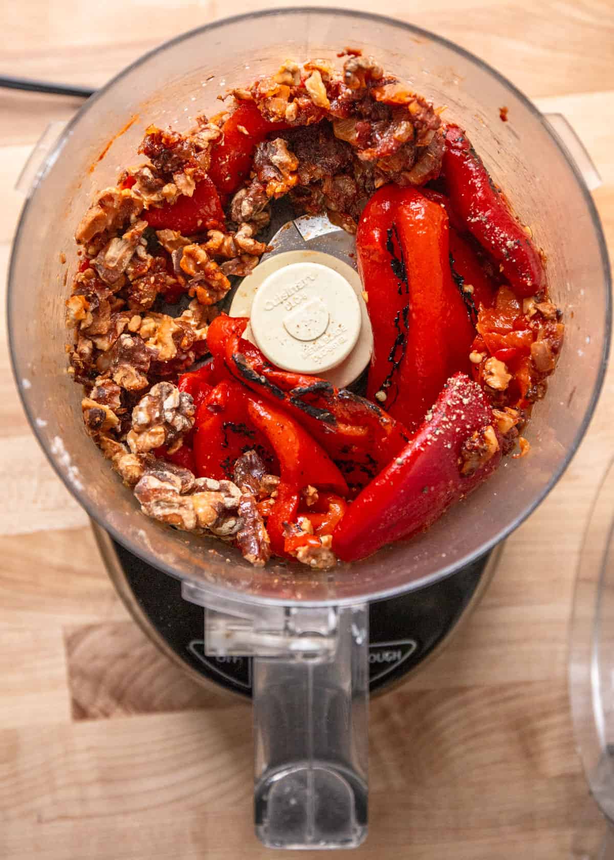 ingredients for red pepper dip in a food processor
