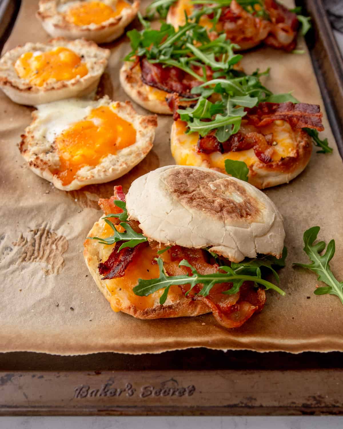 breakfast sandwiches on a parchment lined sheet pan