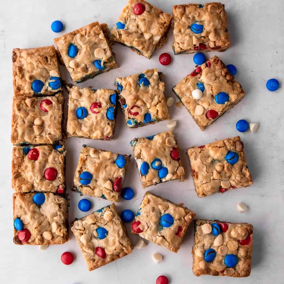 cookie bars with red and blue candies on top