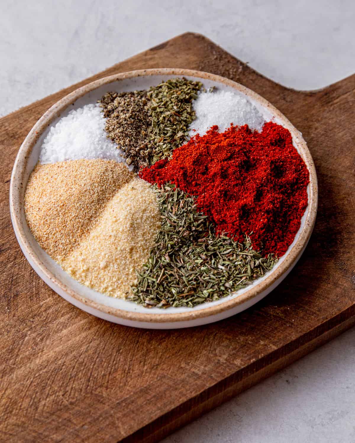 spices in sections in a round bowl
