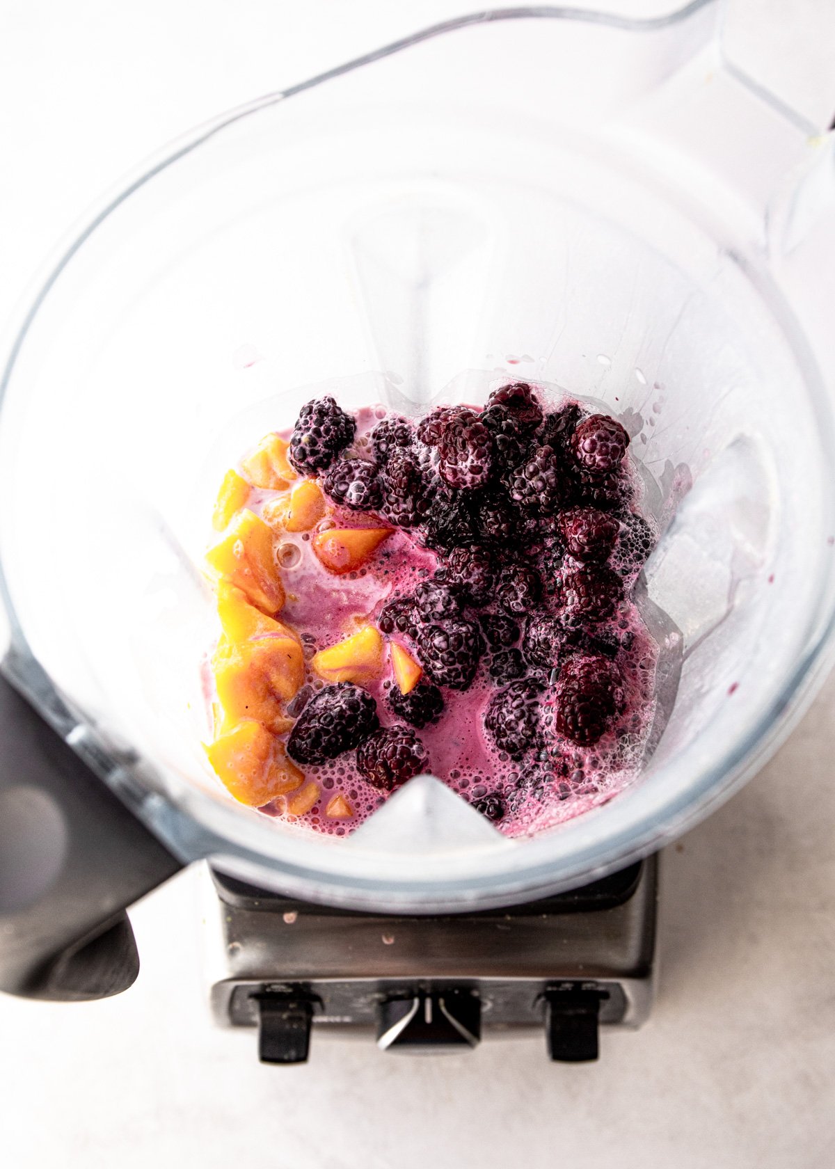top view of fruit in a blender