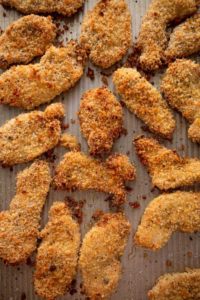 crispy chicken tenders on a sheet pan