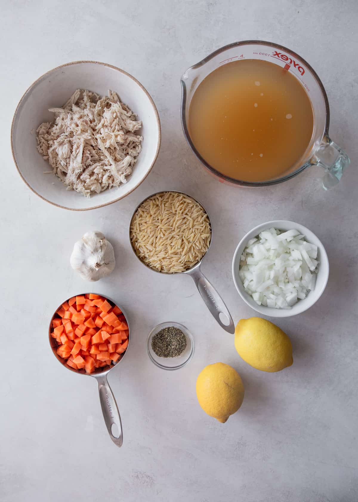 ingredients for soup on a grey countertop