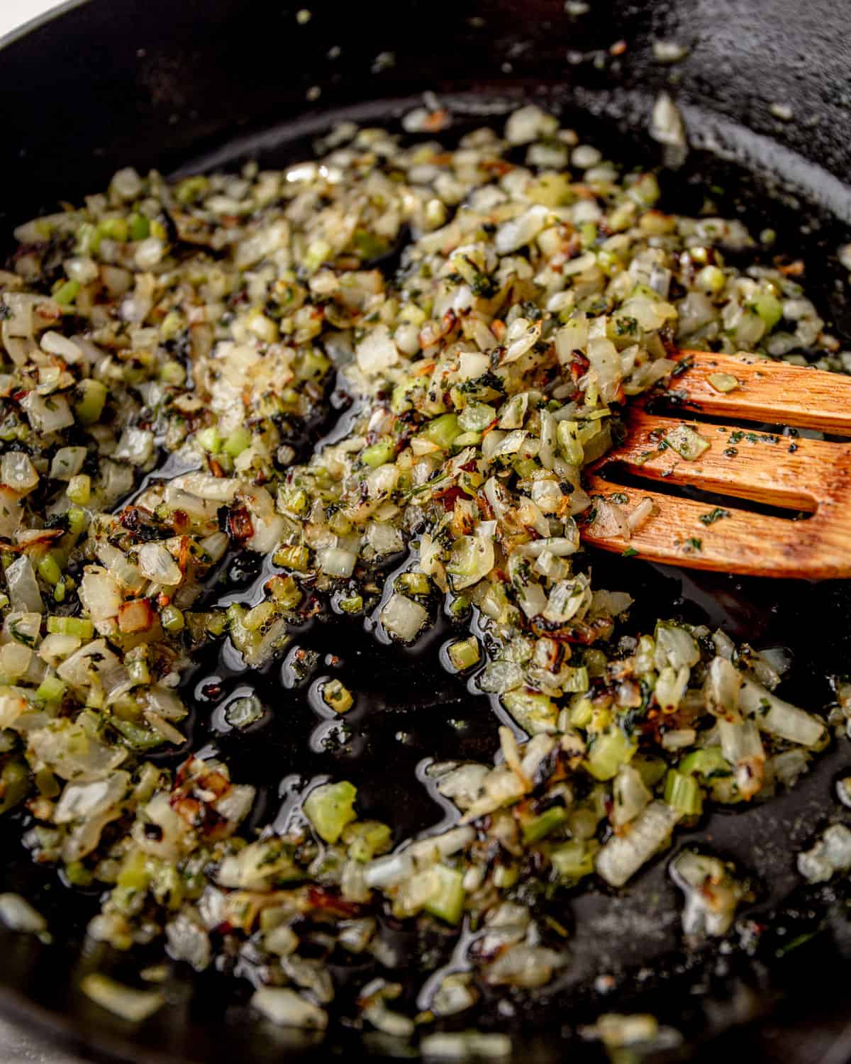 sauteeing aromatics in a skillet