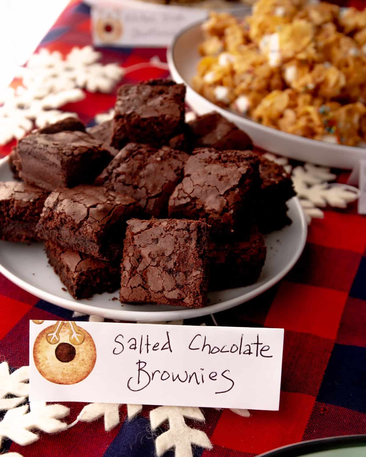 brownies on a white plate with a label