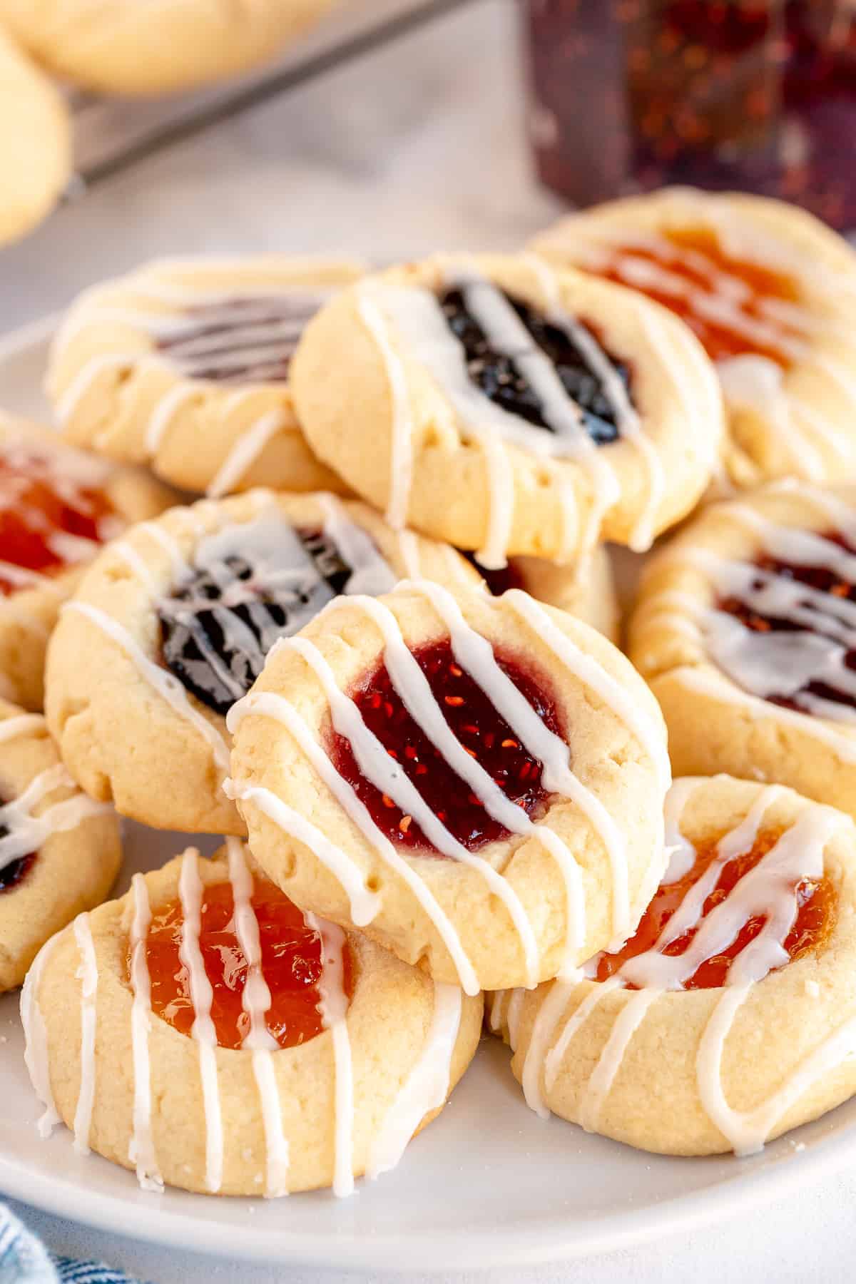 thumbprint cookies on a white plate