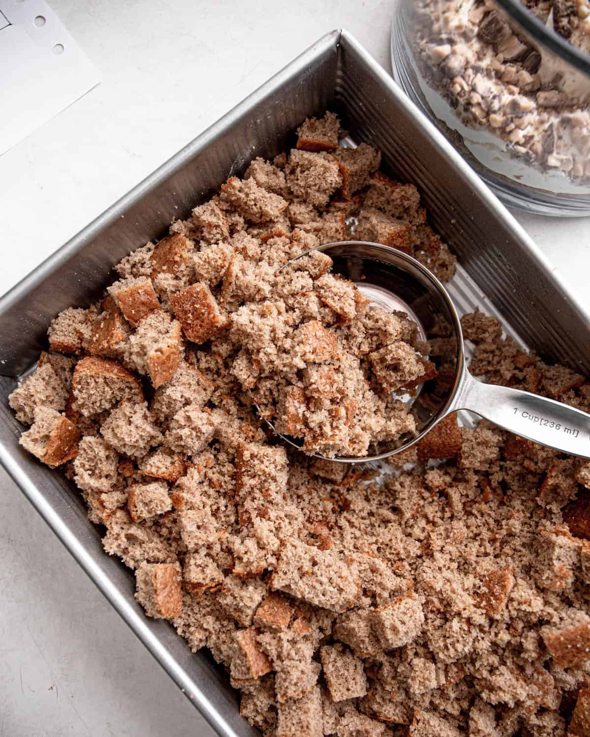 cubed spice cake in a metal baking pan