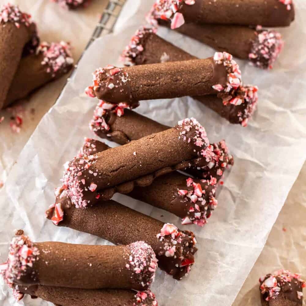 chocolate roll cookies on a wire cooling rack