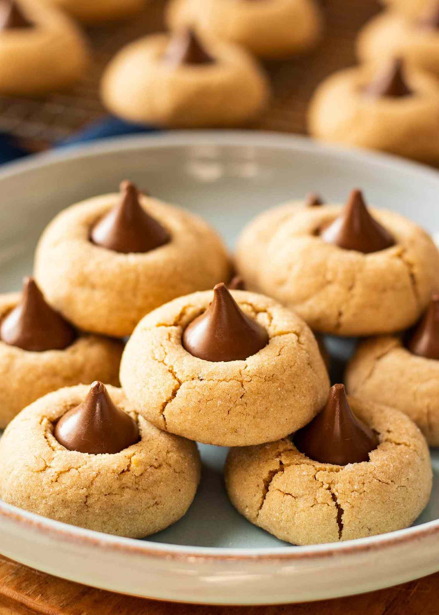 peanut butter blossom cookies on a grey plate