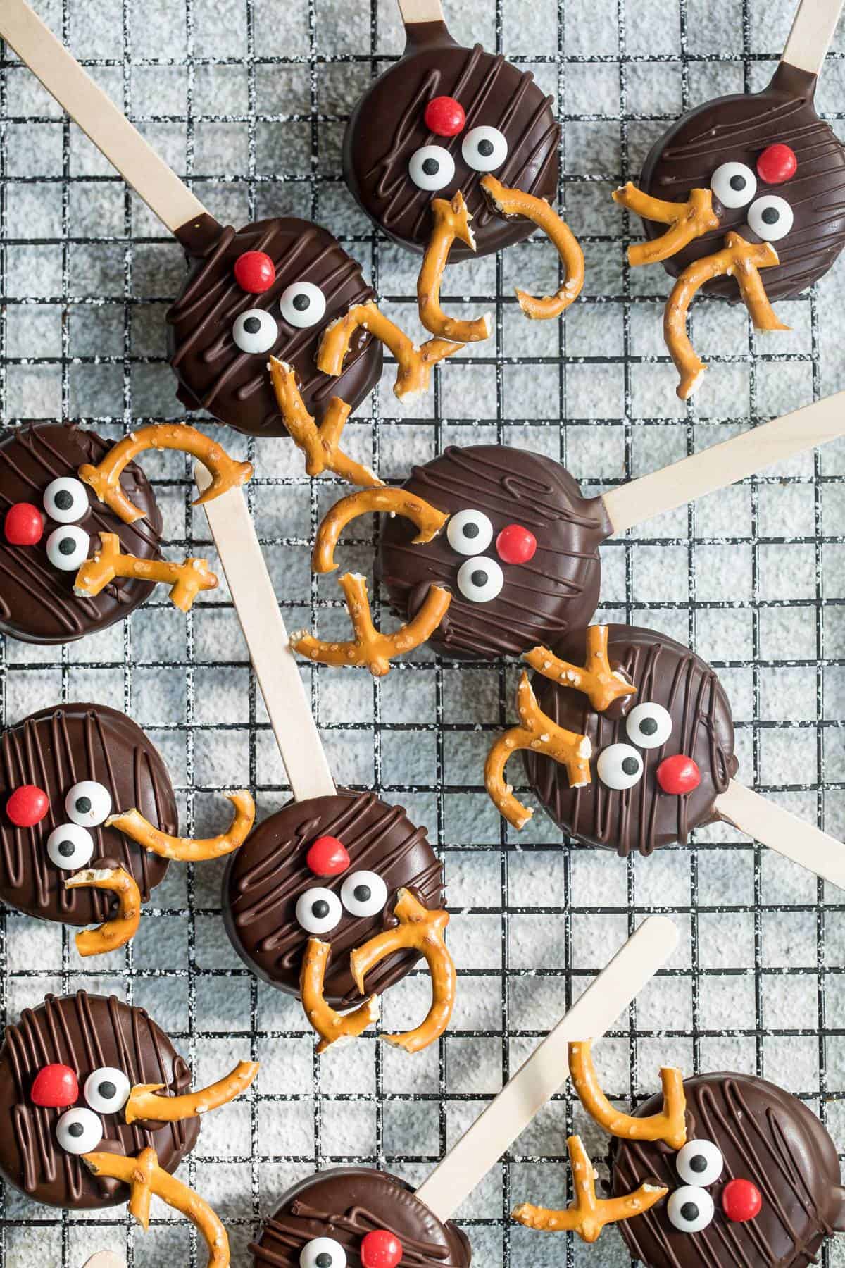 reindeer cake pops on a wire cooling rack