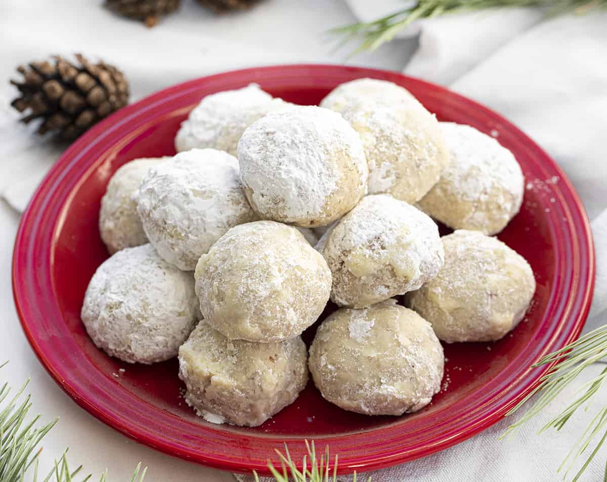 snowball cookies on a red plate