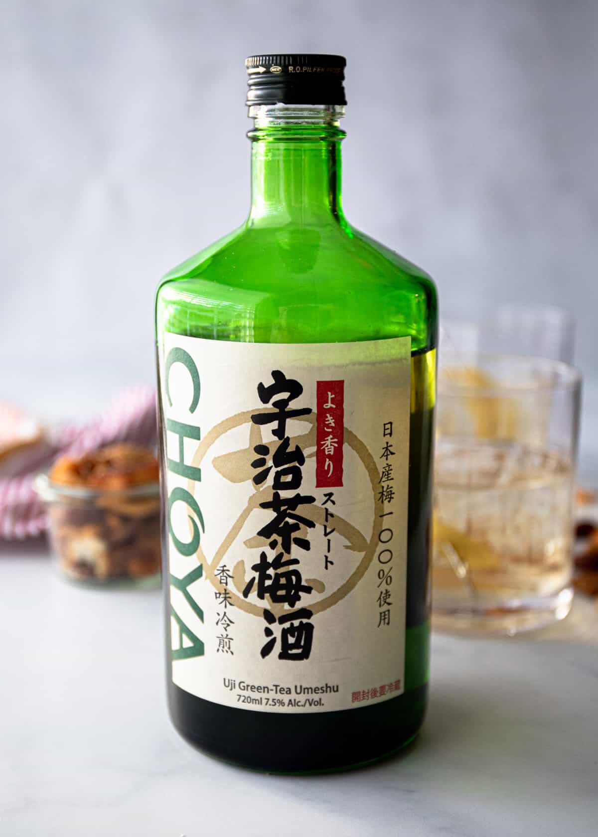 a bottle of umeshu on a grey countertop